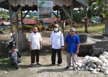 PAC LDII Kelurahan Bumi wonorejo Serahkan Bantuan Pembangunan Pagar TPU SANUSI