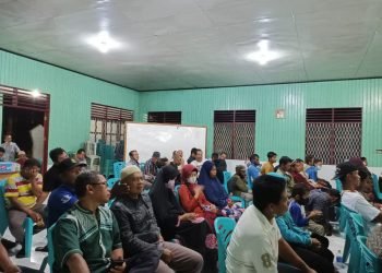 Ketua PC LDII Distrik Nabire dalam mengikuti pertemuan di Kelurahan Bumi wonorejo