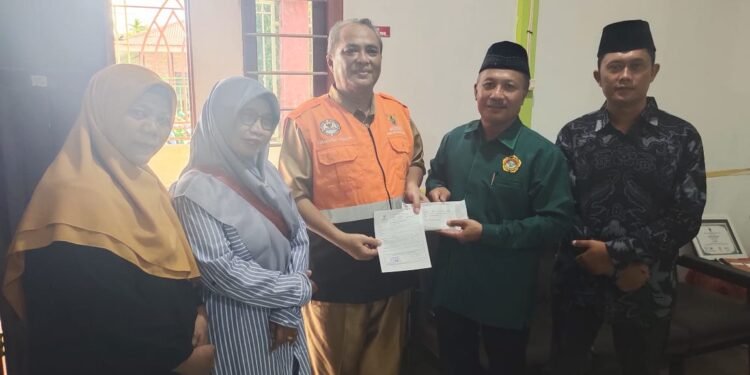 LDII Nabire Salurkan Bantuan Kemanusiaan Korban Bencana Sumatra dan Aceh Melalui BAZNAS